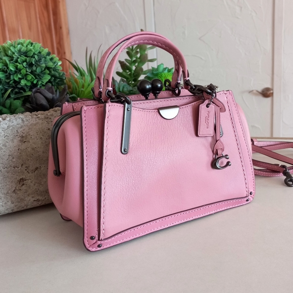Coach Handbags - Coach cross body Kisslock Dreamer 21 in True Pink